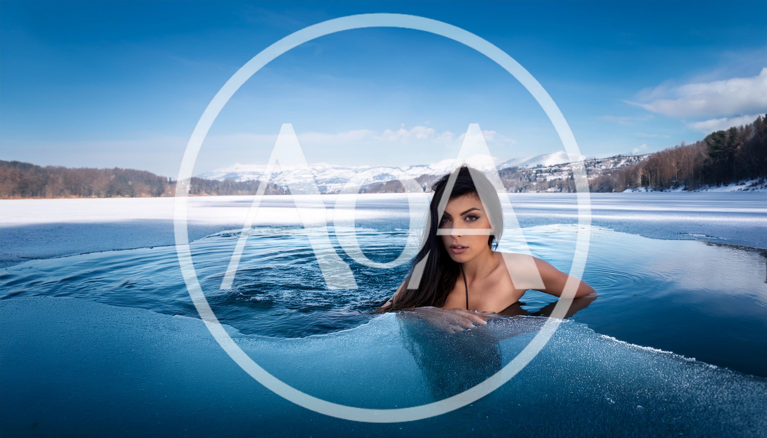 Woman Swimming In A Frozen Lake Hole