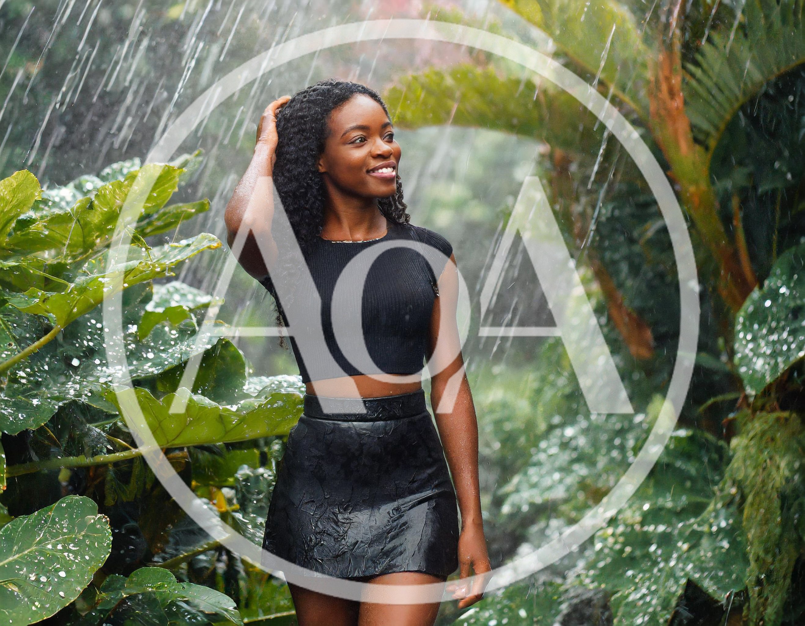 Young Woman Enjoying Tropical Rain in Lush Garden
