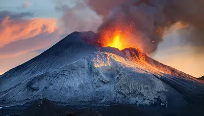 Volcanic Eruption With Glowing Lava And Ash Plume