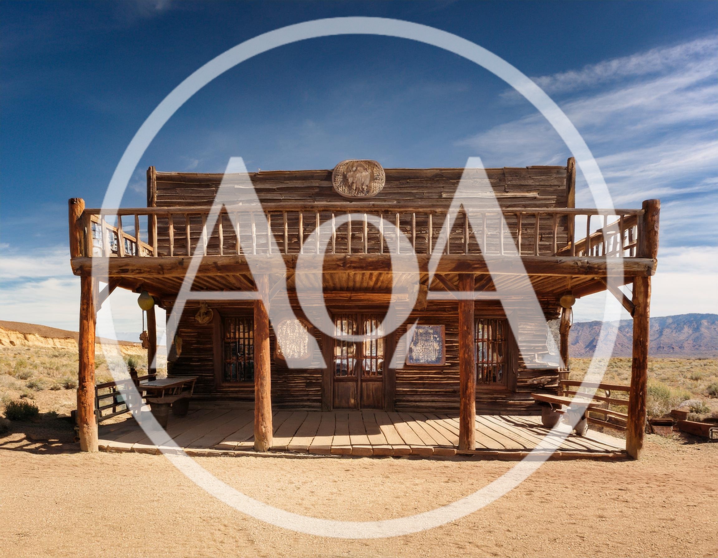 Old Western Wooden Saloon Building In Desert Landscape