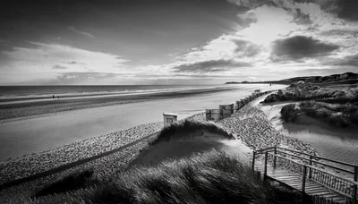 Black and White Coastal Landscape With Wooden Boardwalk
