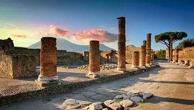 Ancient Roman Ruins Of Pompeii With Mount Vesuvius
