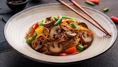 Stir Fried Glass Noodles With Vegetables And Mushrooms