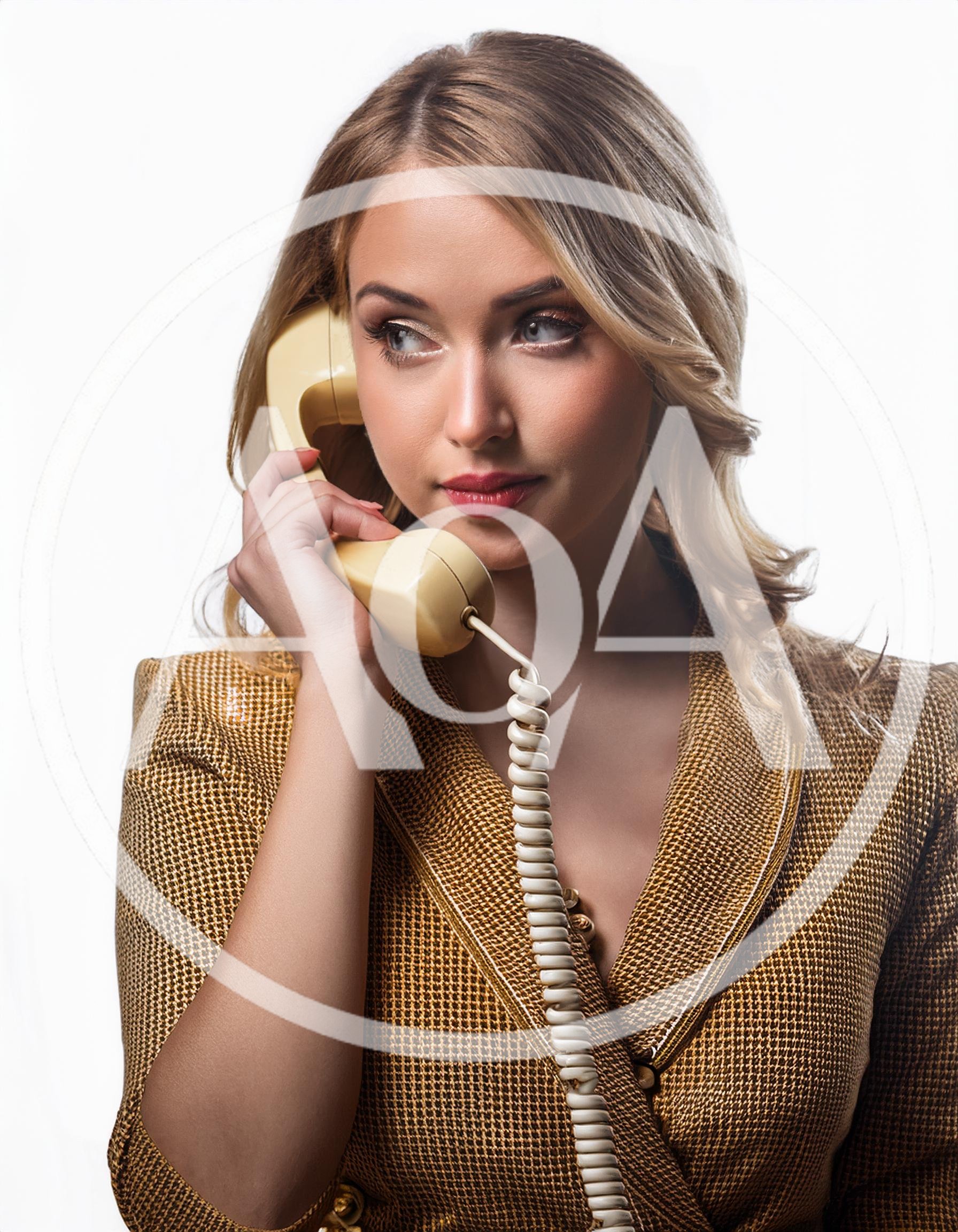 Elegant Blonde Woman Talking On Vintage Telephone
