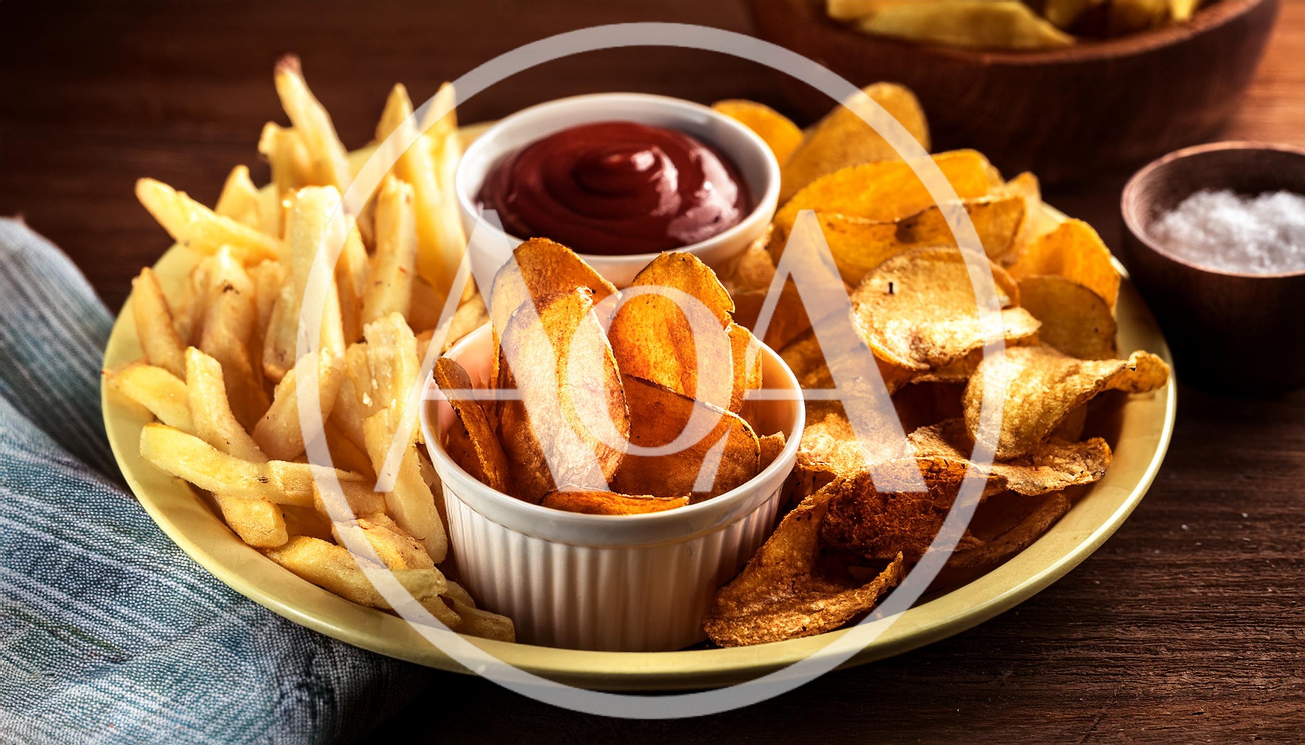 Assorted Potato Snacks With Ketchup On A Plate