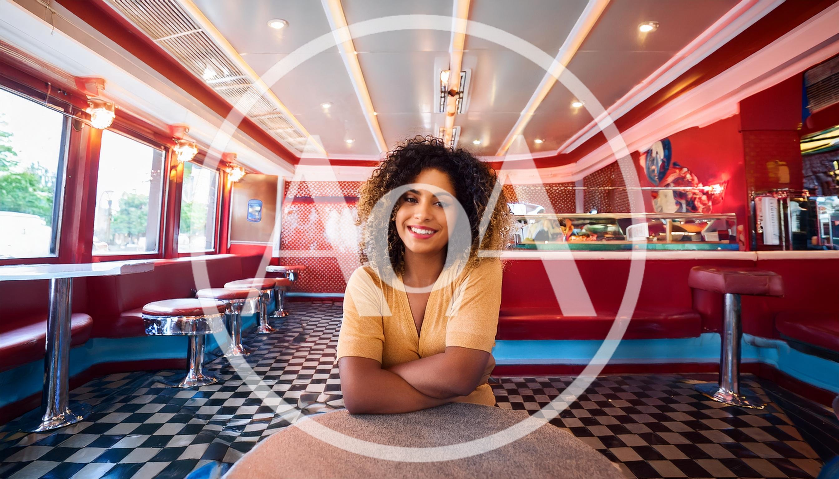 Young Woman Smiling In A Retro American Diner