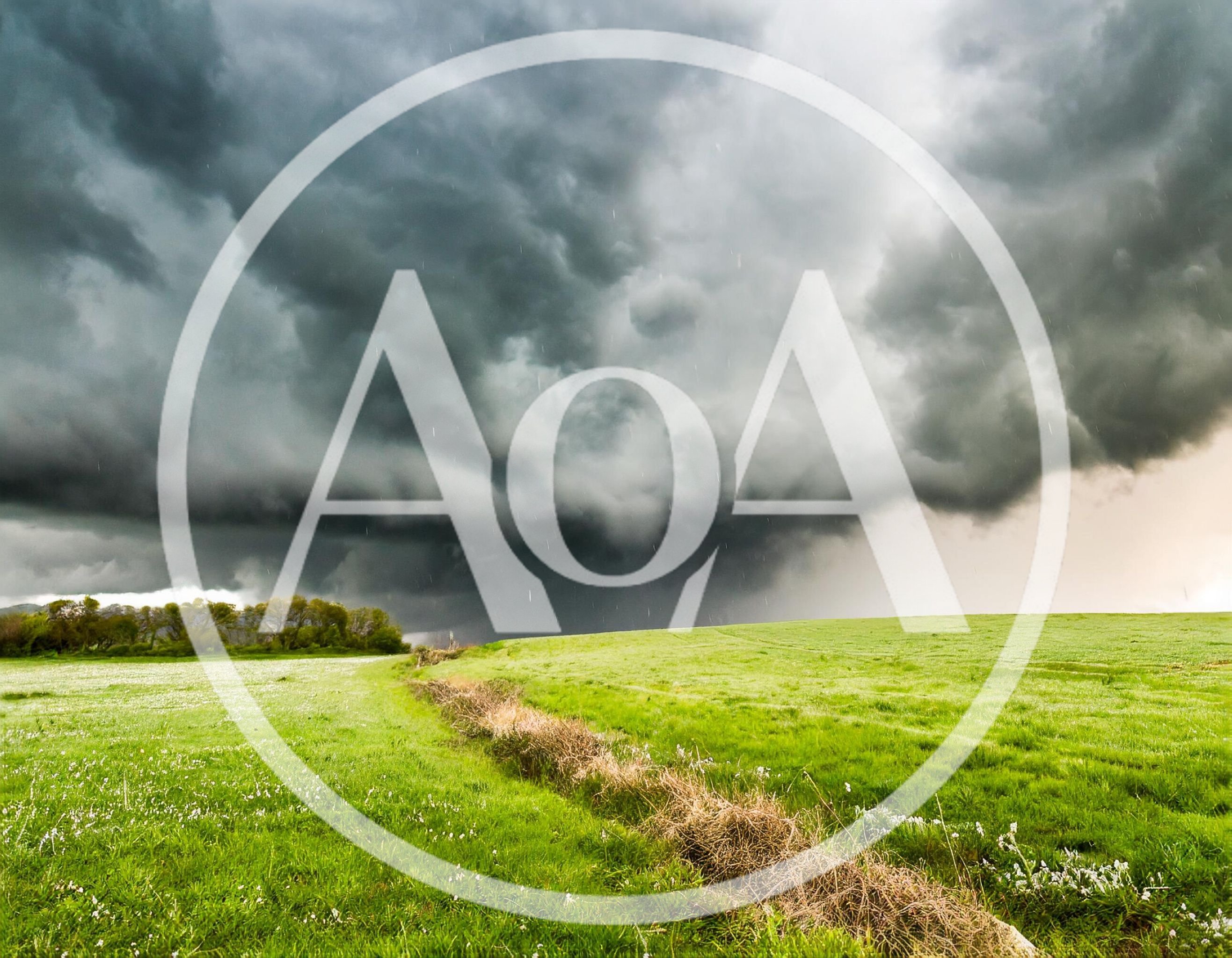 Dramatic Storm Clouds Over A Green Rural Field