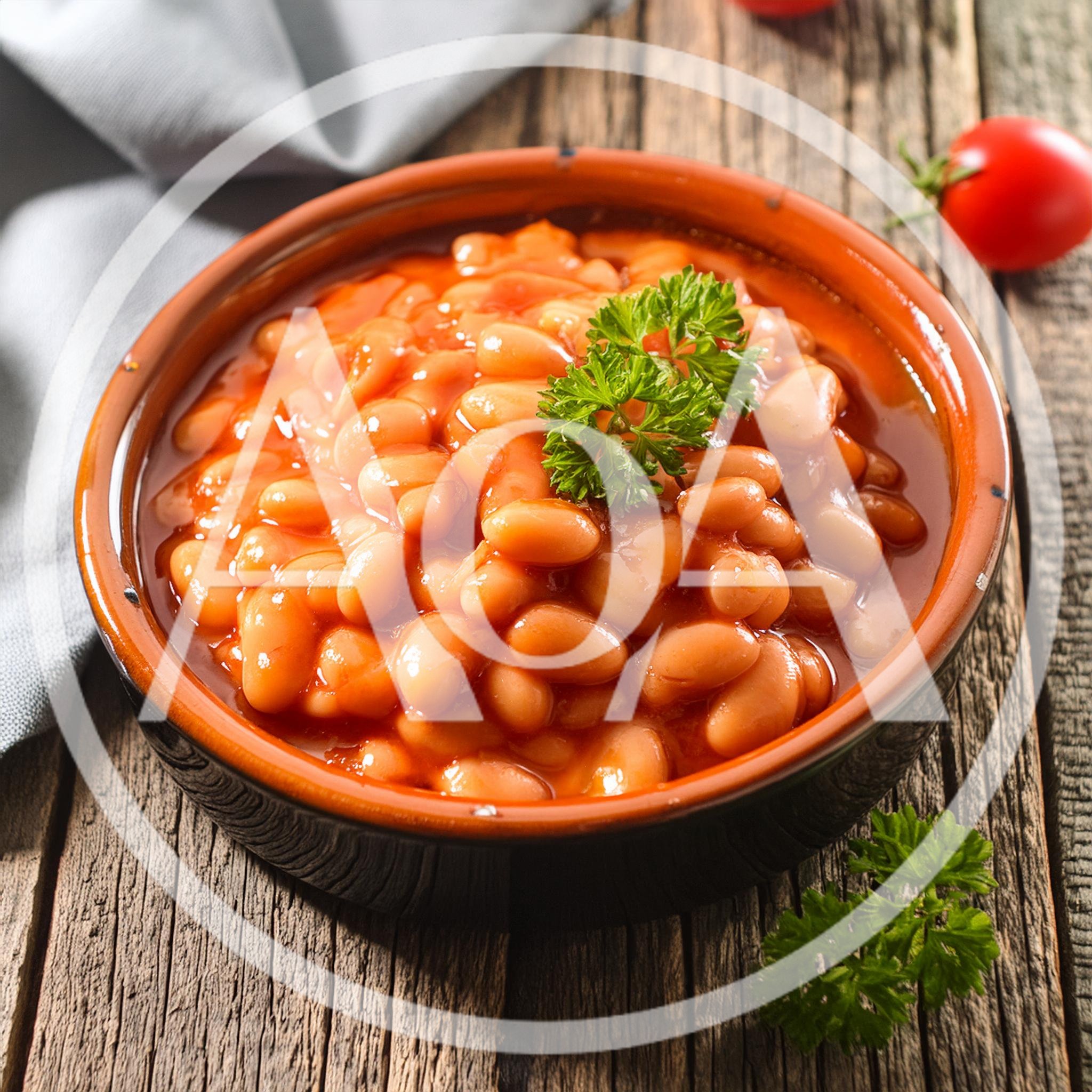 Bowl Of Baked Beans With Parsley Garnish