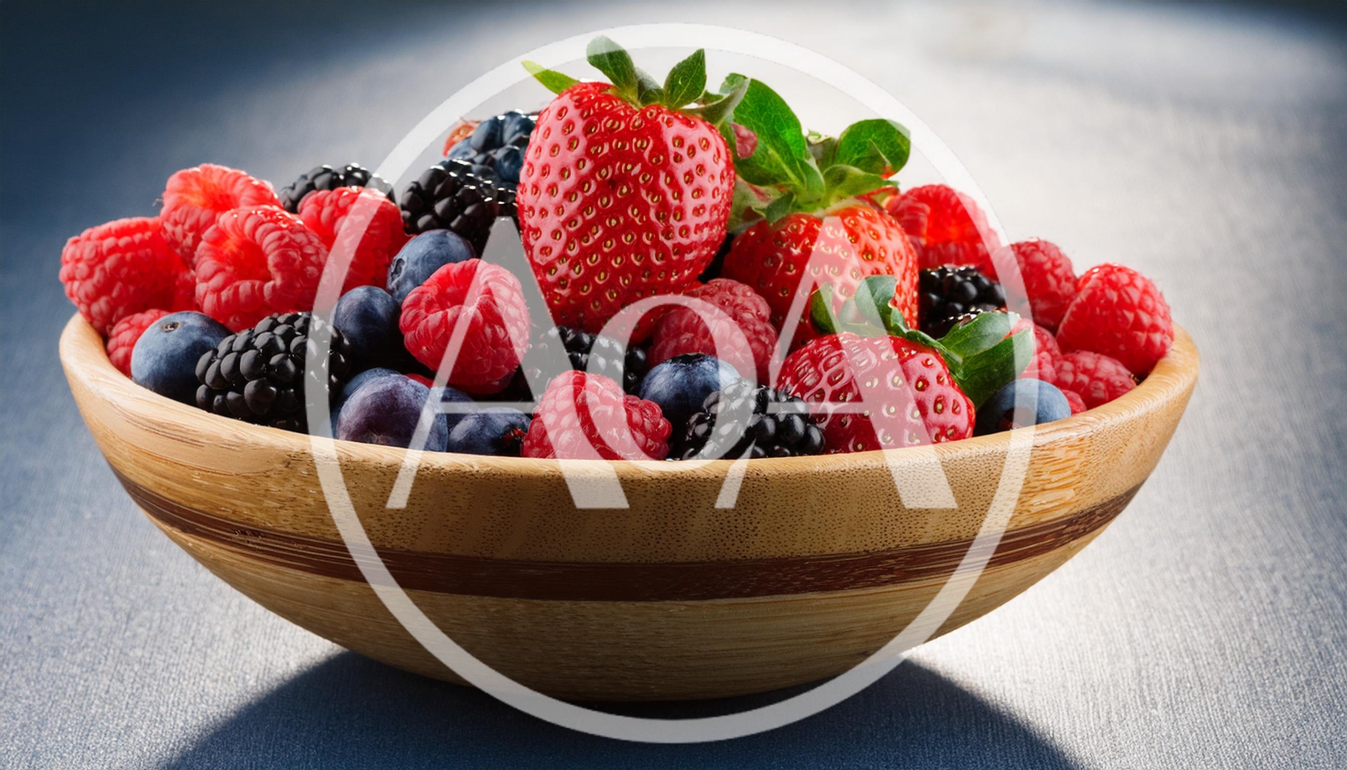 Fresh Mixed Berries In A Wooden Bowl