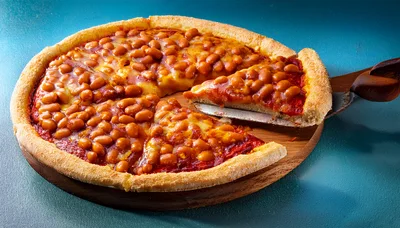 Baked Bean Pizza Slice On A Serving Spatula