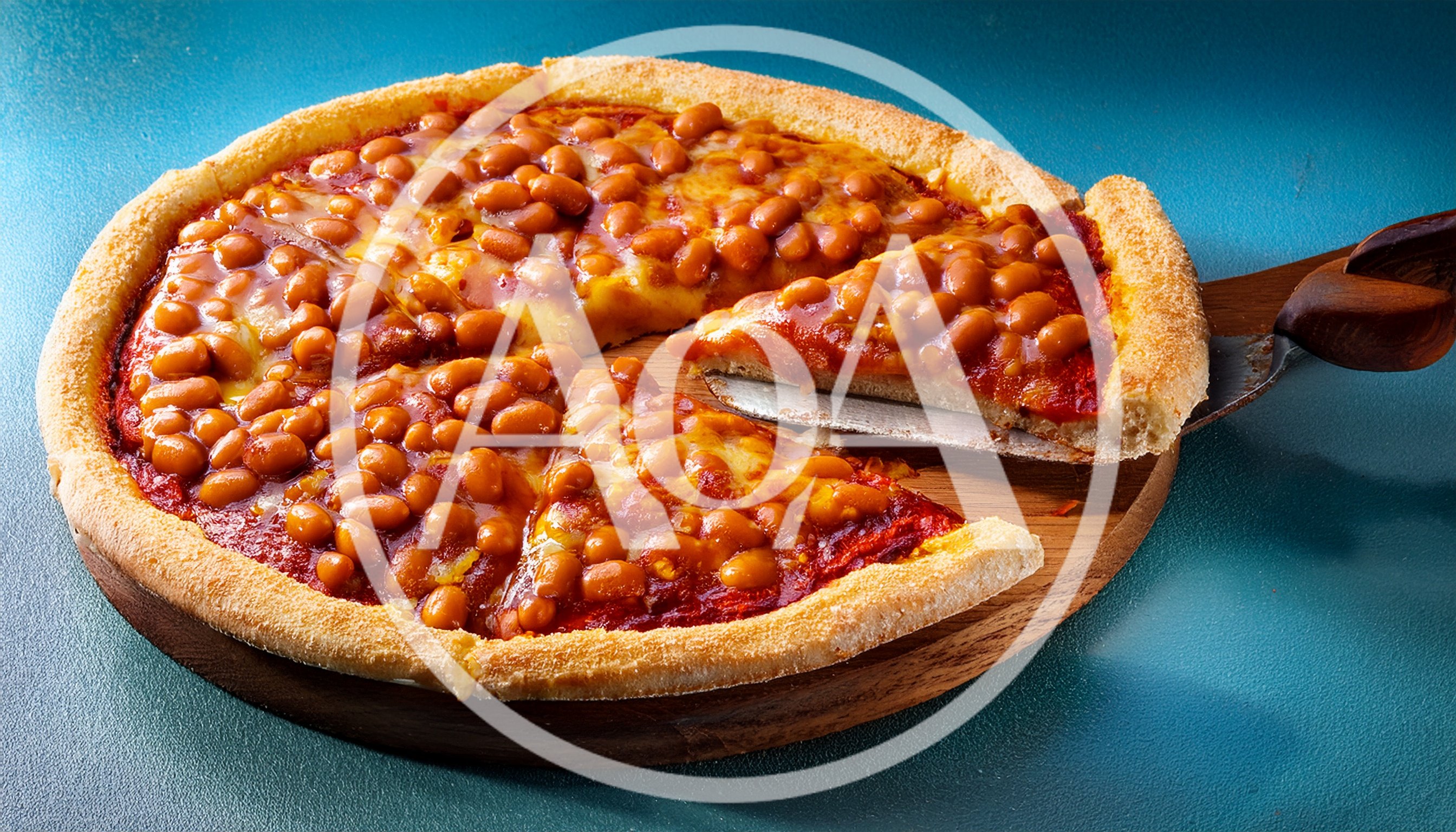 Baked Bean Pizza Slice On A Serving Spatula