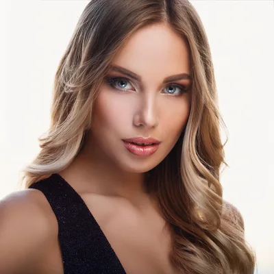 Portrait Of A Beautiful Blonde Woman With Blue Eyes