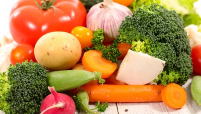 Fresh Assorted Raw Vegetables on Wooden Table