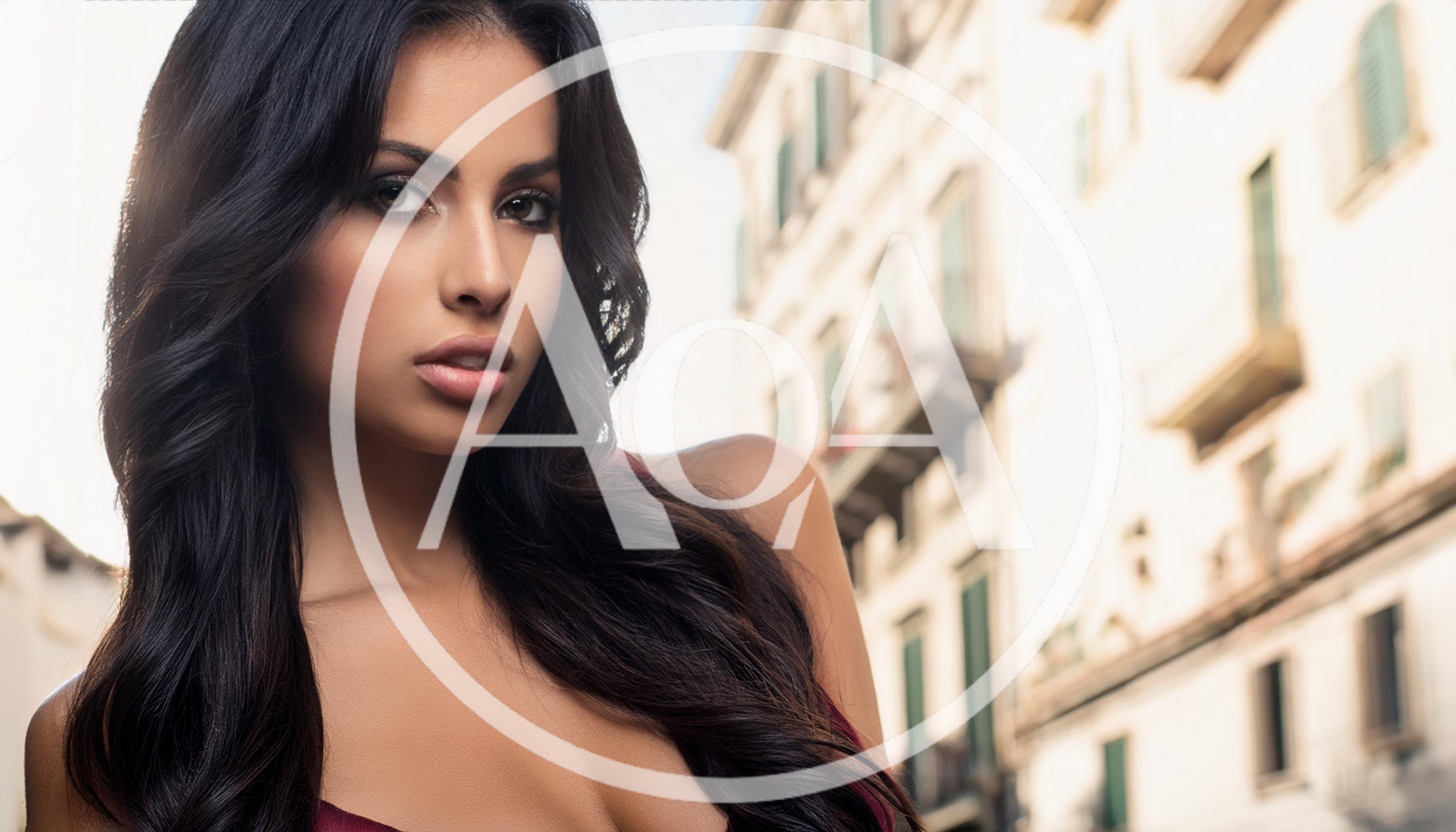 Portrait Of A Beautiful Woman With Long Dark Hair