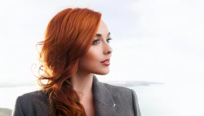 Portrait Of A Beautiful Woman With Red Hair