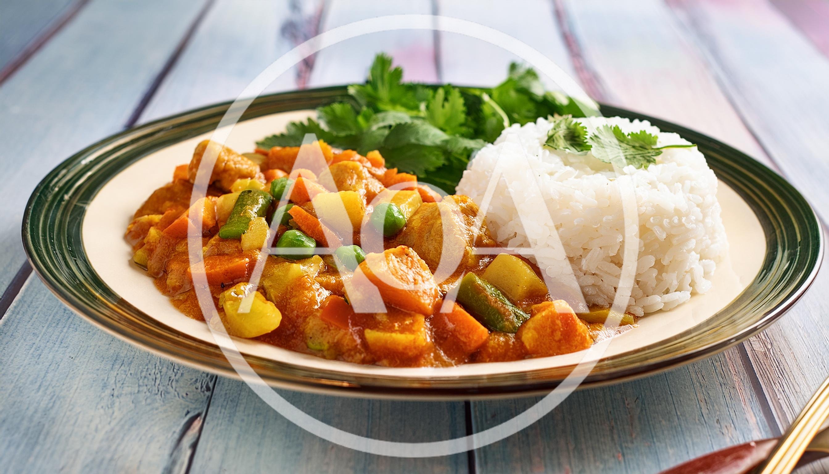 Vegetable Curry With Steamed White Rice On Plate