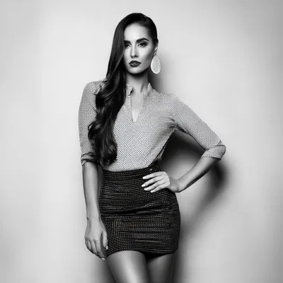 Fashionable Woman Posing In A Polka Dot Outfit