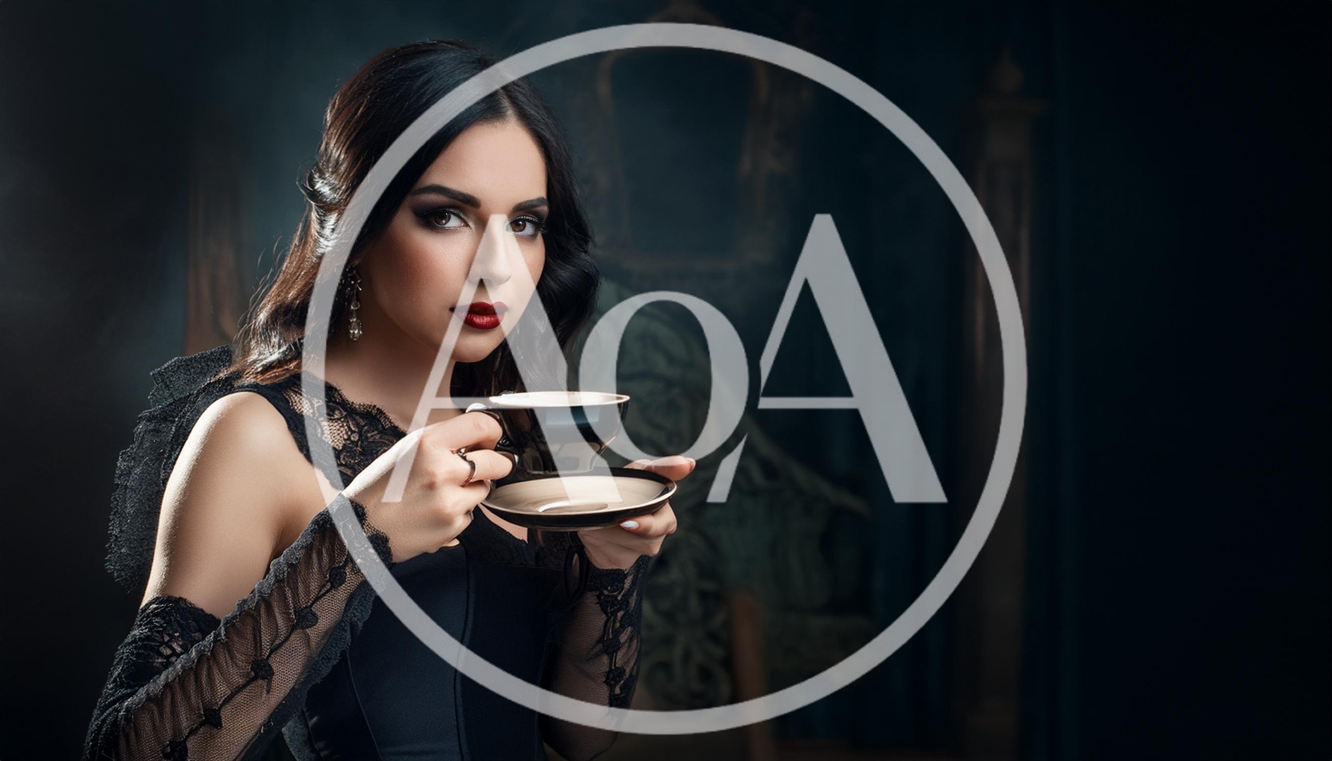 Elegant Woman Holding A Tea Cup In Dark Interior
