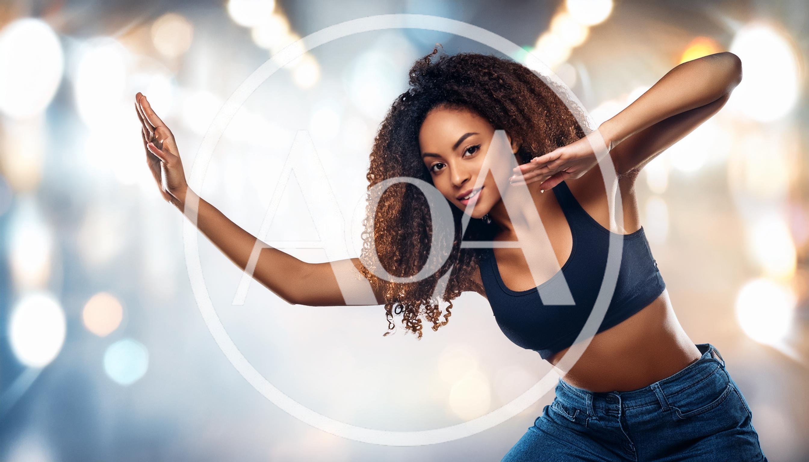 Young Woman Dancing With Curly Hair In Studio