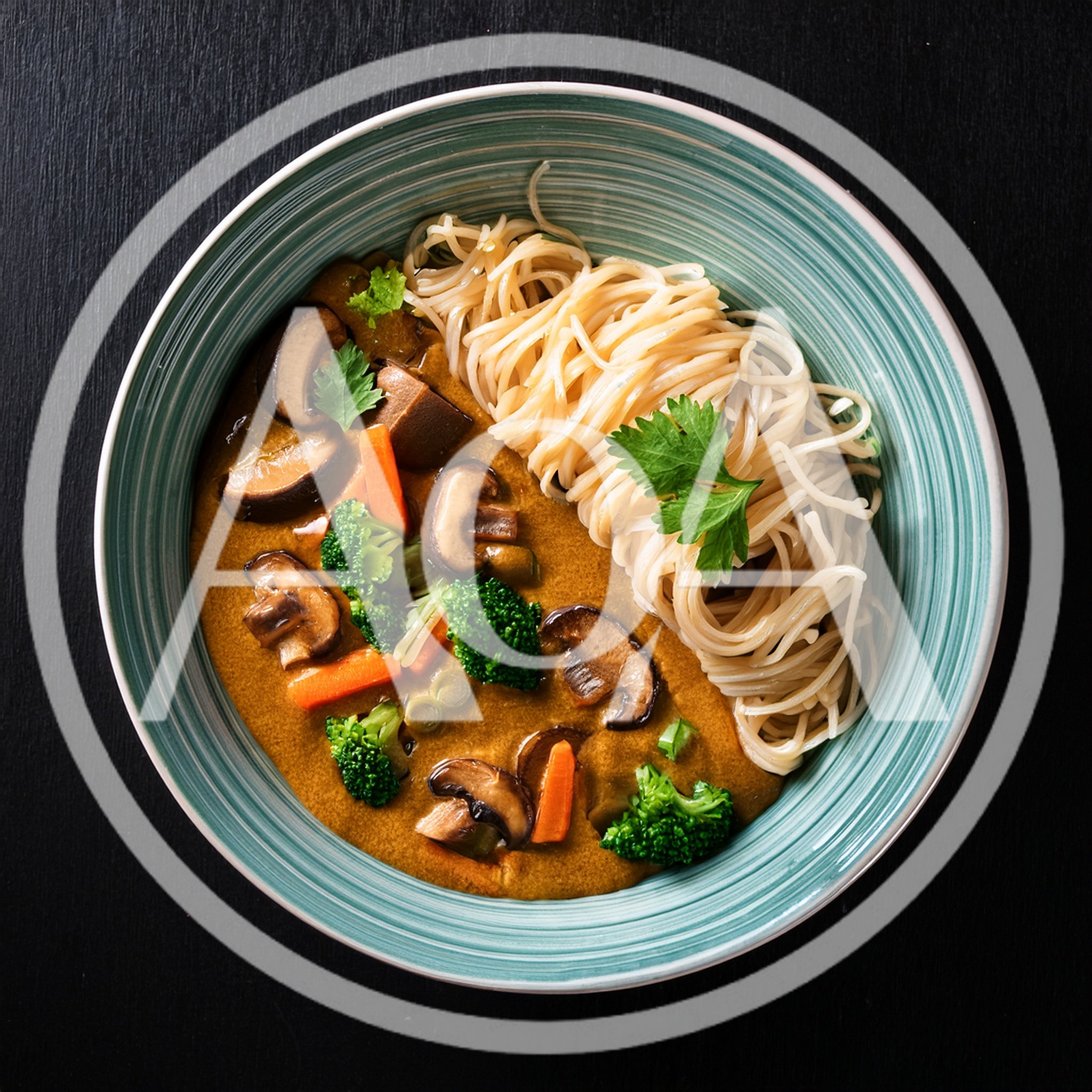 Bowl Of Vegetable Curry With Noodles