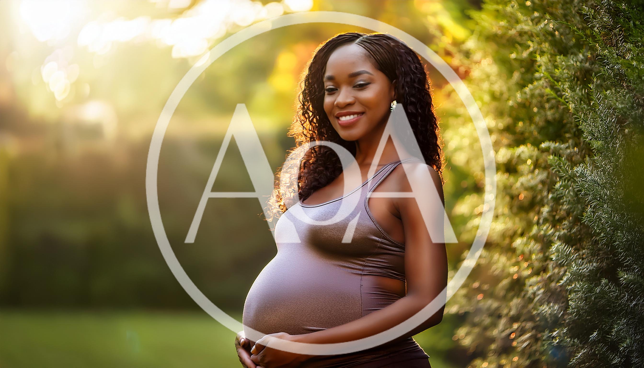 Pregnant Woman Smiling Outdoors During Golden Hour