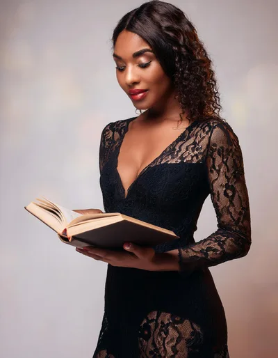 Elegant Woman Reading A Book In Lace Dress