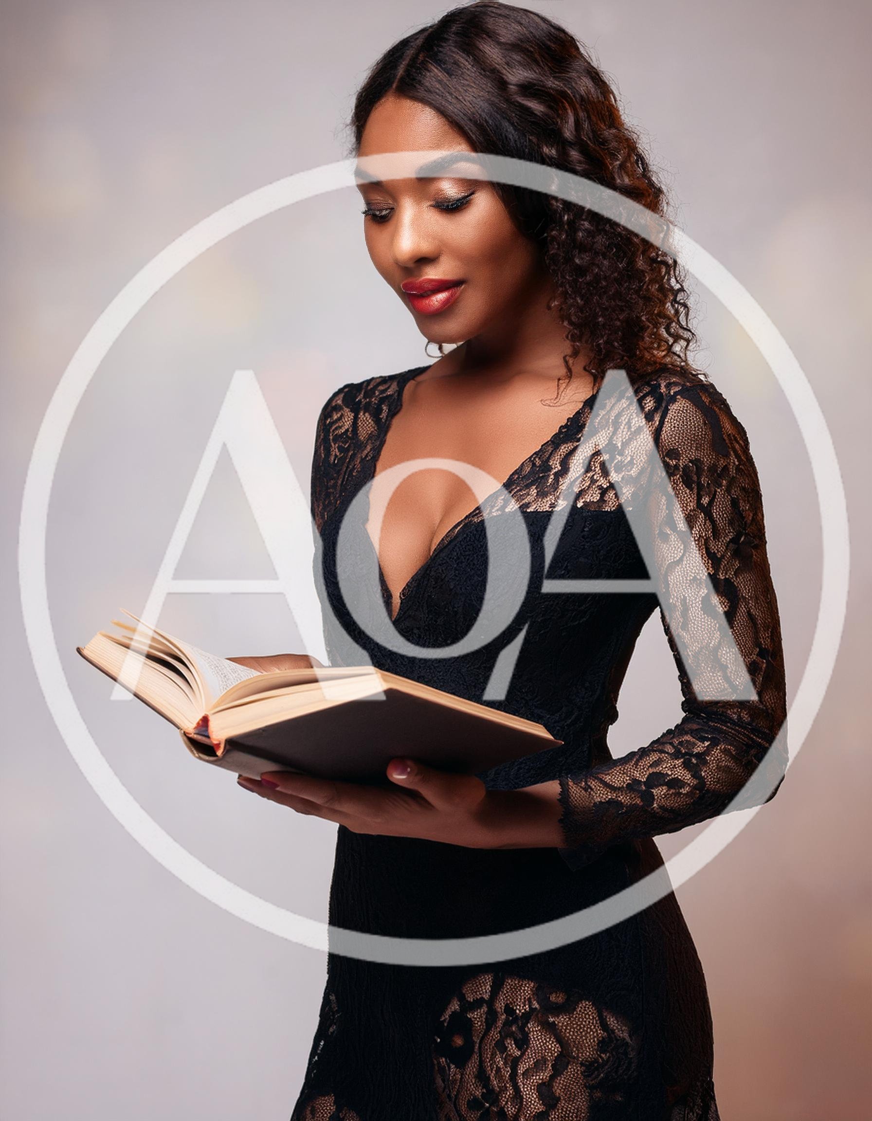 Elegant Woman Reading A Book In Lace Dress