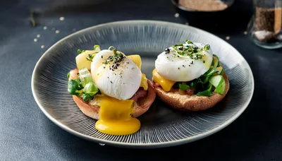 Two Poached Eggs On Toasted English Muffins