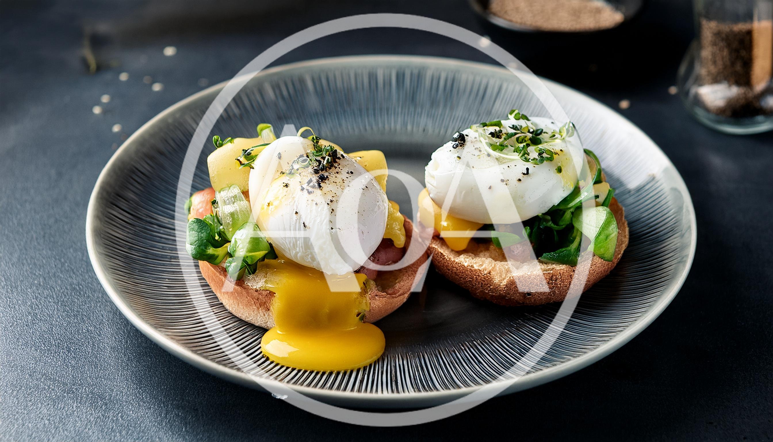 Two Poached Eggs On Toasted English Muffins