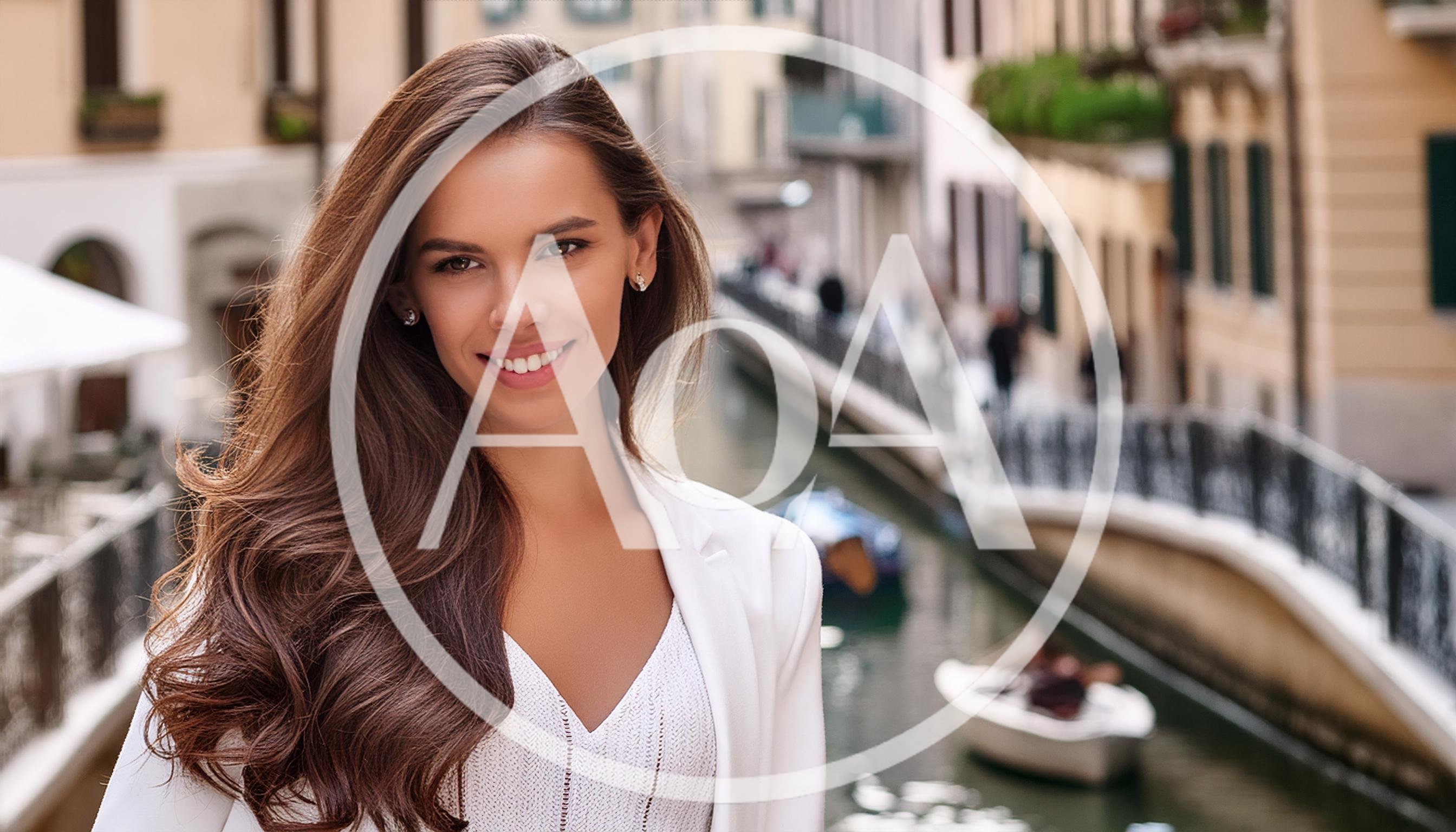 Beautiful Woman Smiling On A Bridge In Venice