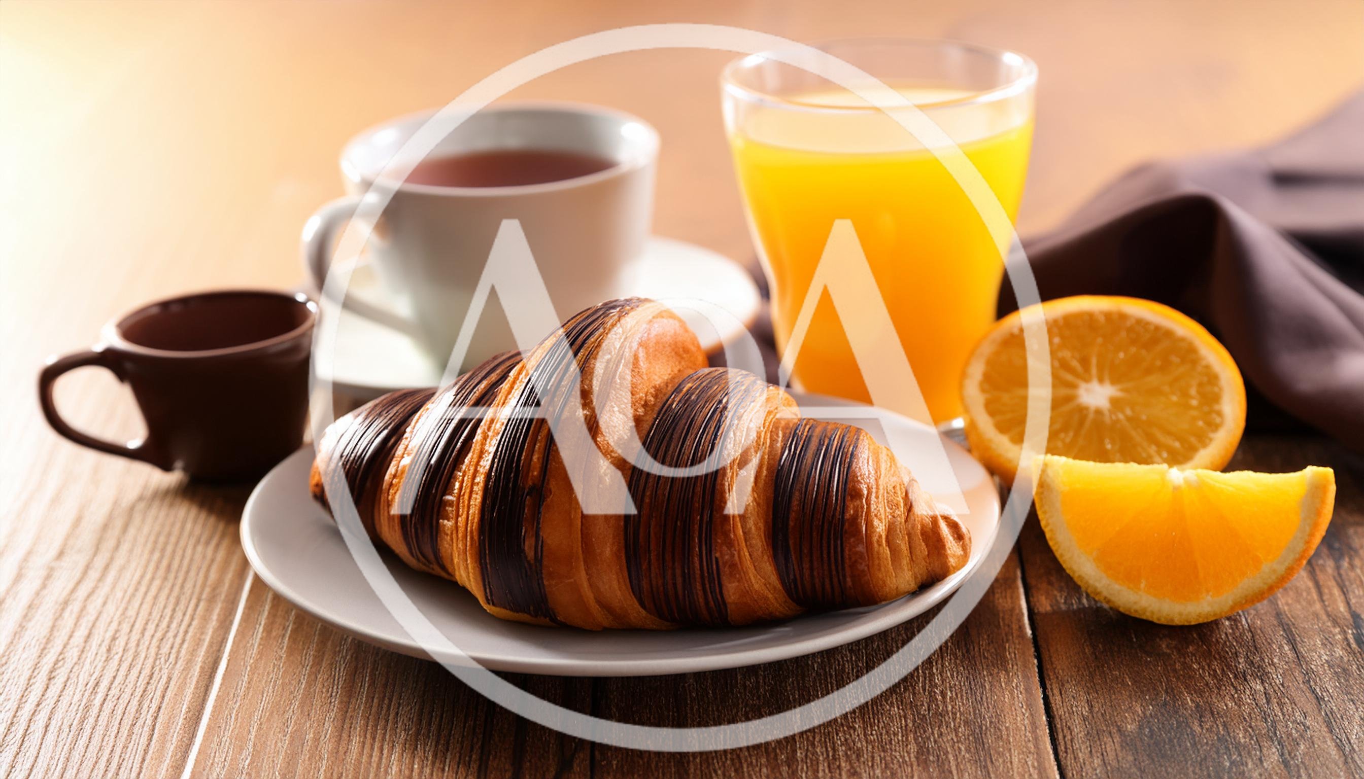 Chocolate Drizzled Croissant Breakfast With Orange Juice