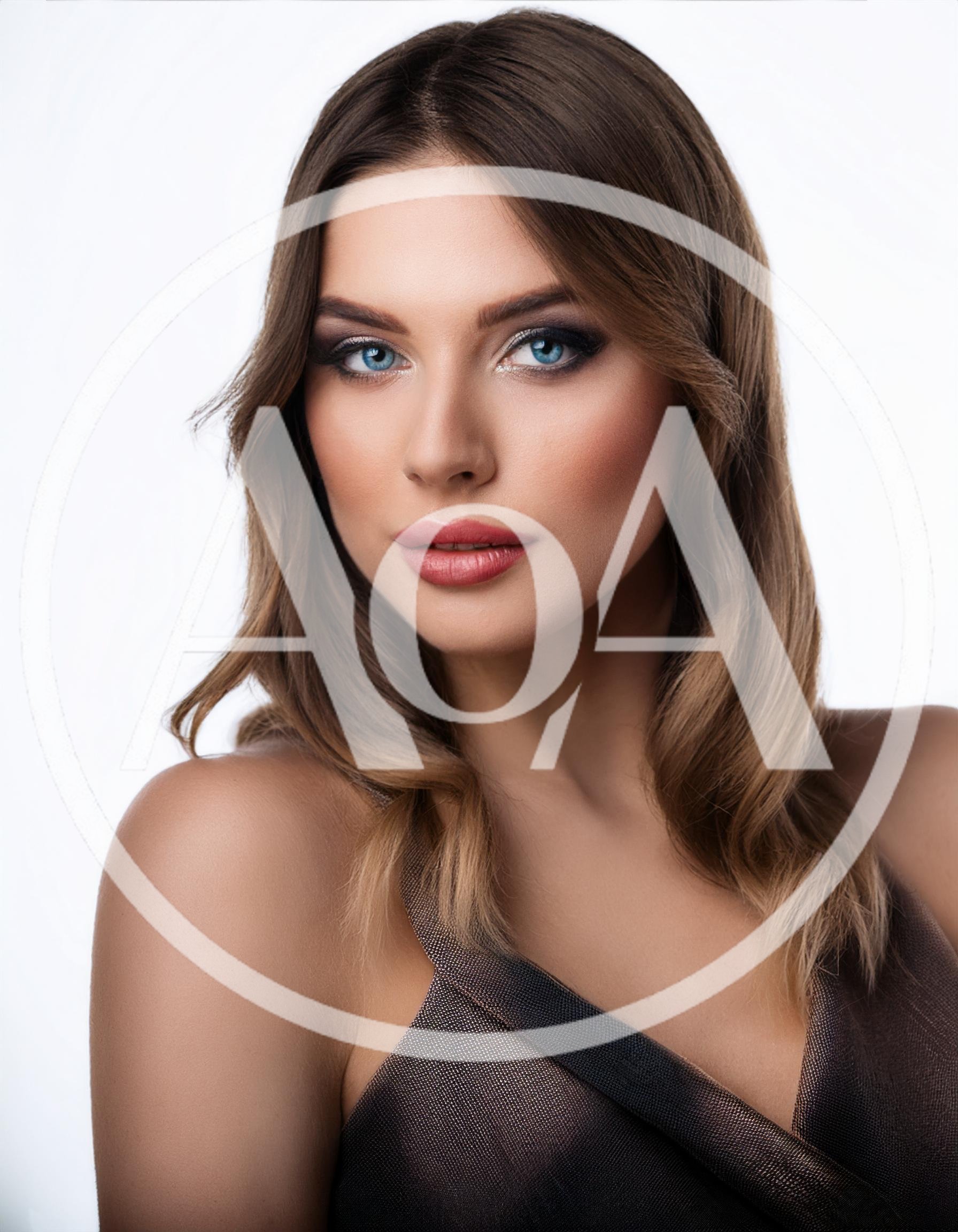 Portrait Of A Beautiful Woman With Blue Eyes