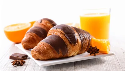 Chocolate Drizzled Croissants With Orange Juice And Spices