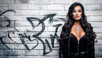 Portrait Of A Glamorous Woman Against A Graffiti Wall