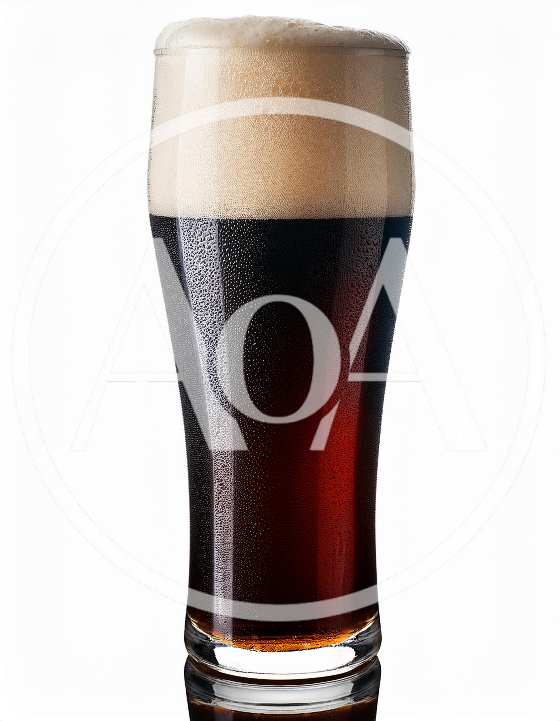 Cold Glass Of Dark Stout Beer With Foam