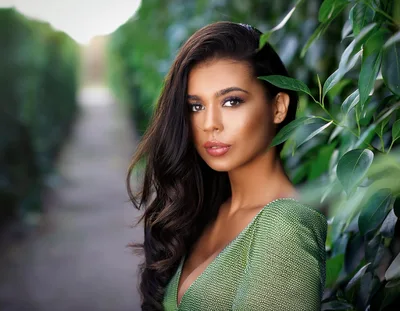 Portrait Of A Beautiful Woman In A Green Dress
