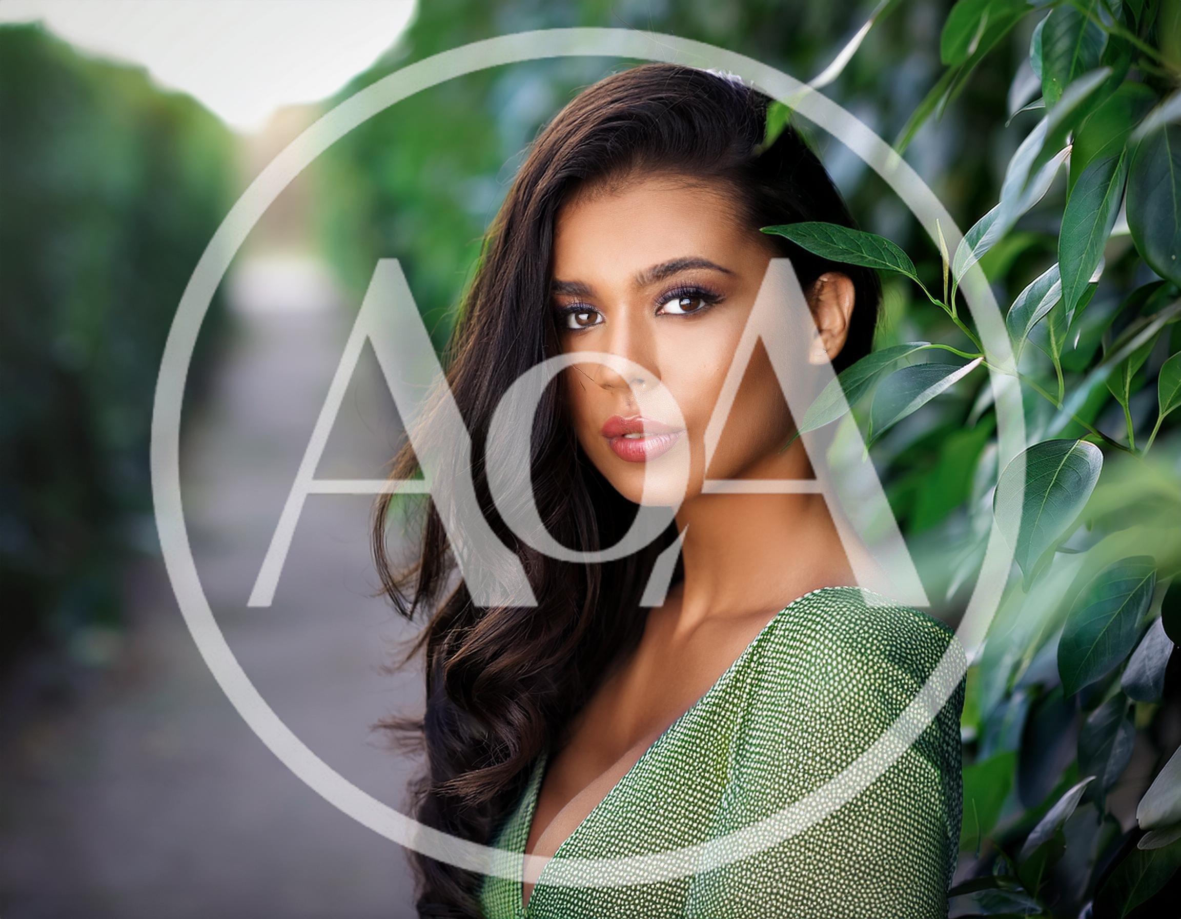 Portrait Of A Beautiful Woman In A Green Dress