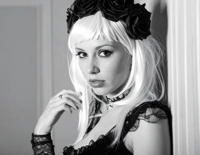 Portrait Of A Woman Wearing A Black Rose Crown