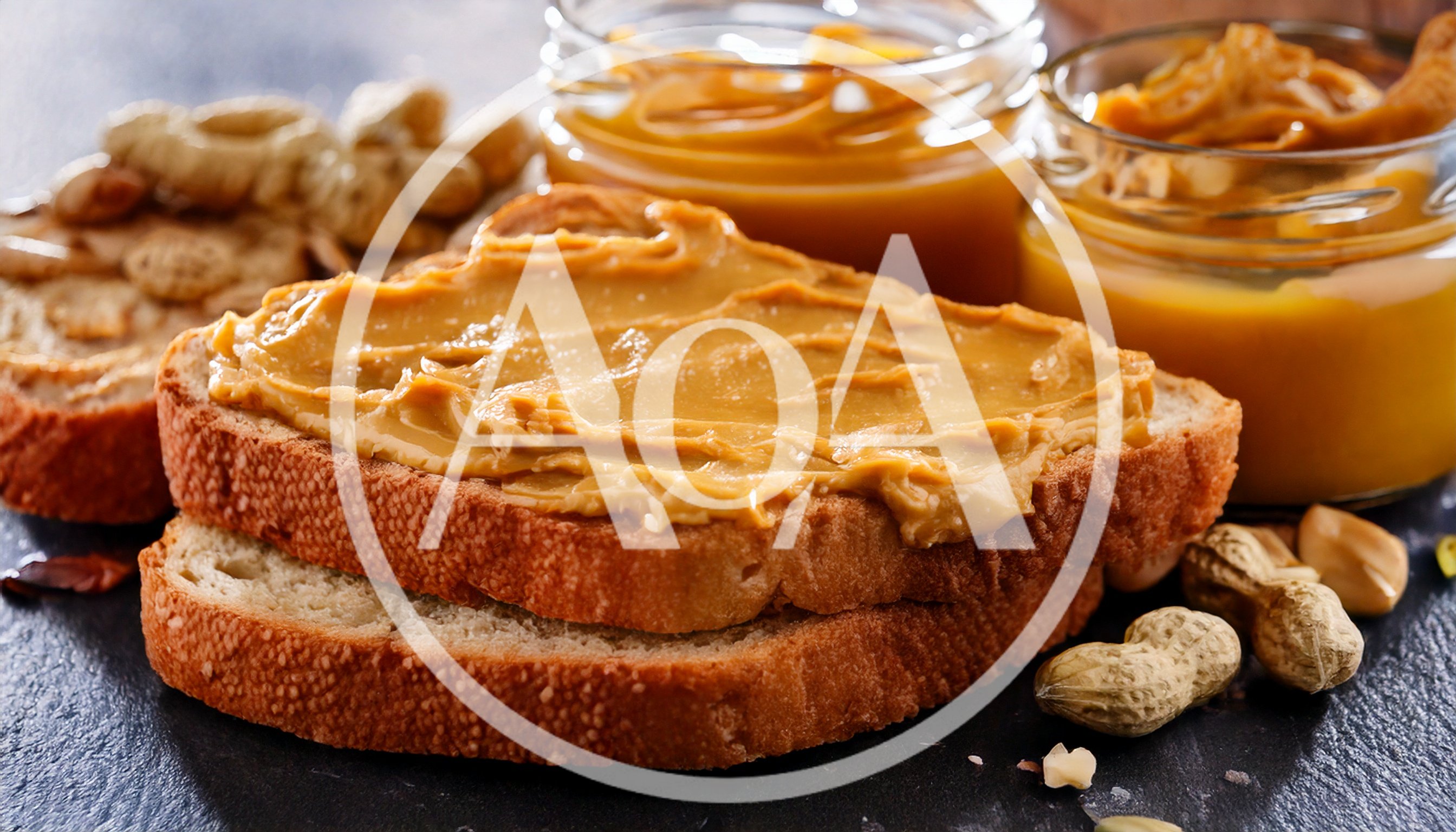 Peanut Butter Spread On Slices Of Toasted Bread