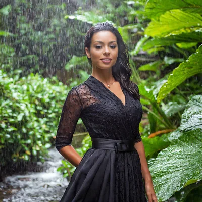 Elegant Woman Standing In Tropical Rain Forest