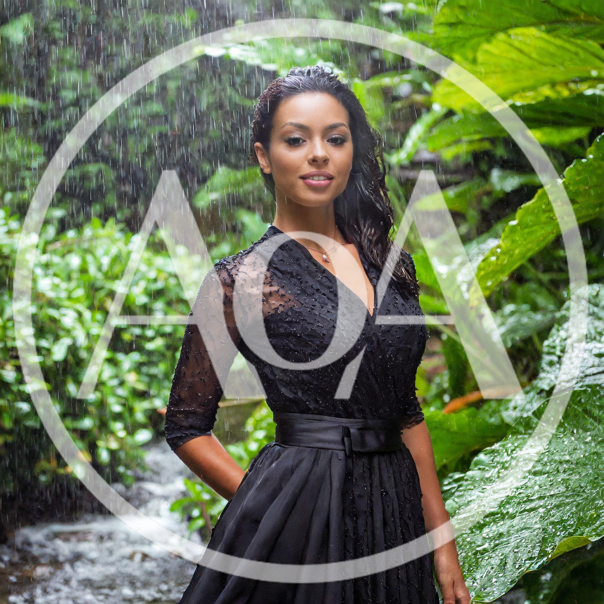 Elegant Woman Standing In Tropical Rain Forest