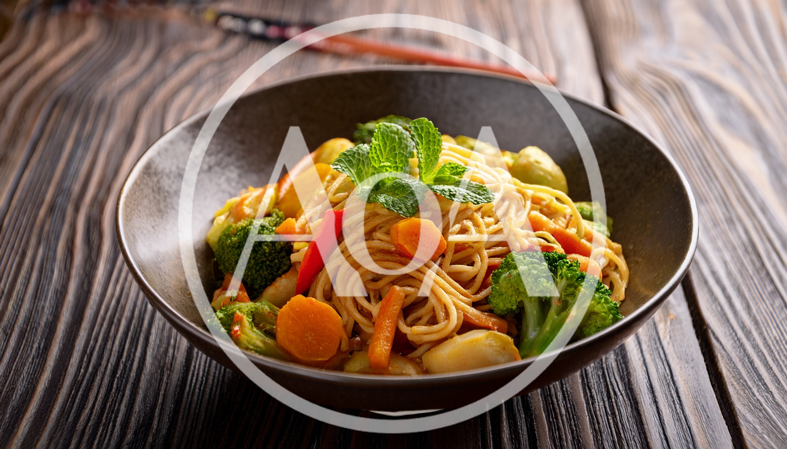 Vegetable Stir Fry Noodles in a Dark Bowl