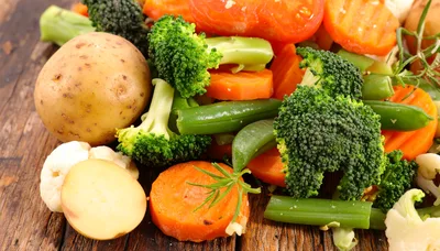 Fresh Raw Vegetables On A Rustic Wooden Surface