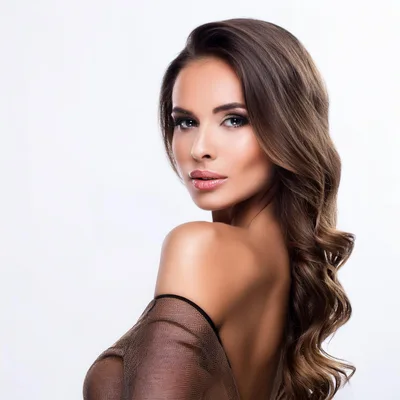 Portrait Of A Beautiful Woman With Long Wavy Hair