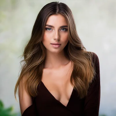 Portrait Of A Beautiful Young Woman With Long Hair