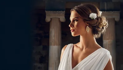 Elegant Woman In Grecian Style Dress And Jewelry