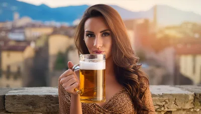 Beautiful Woman Holding A Large Beer Mug Outdoors
