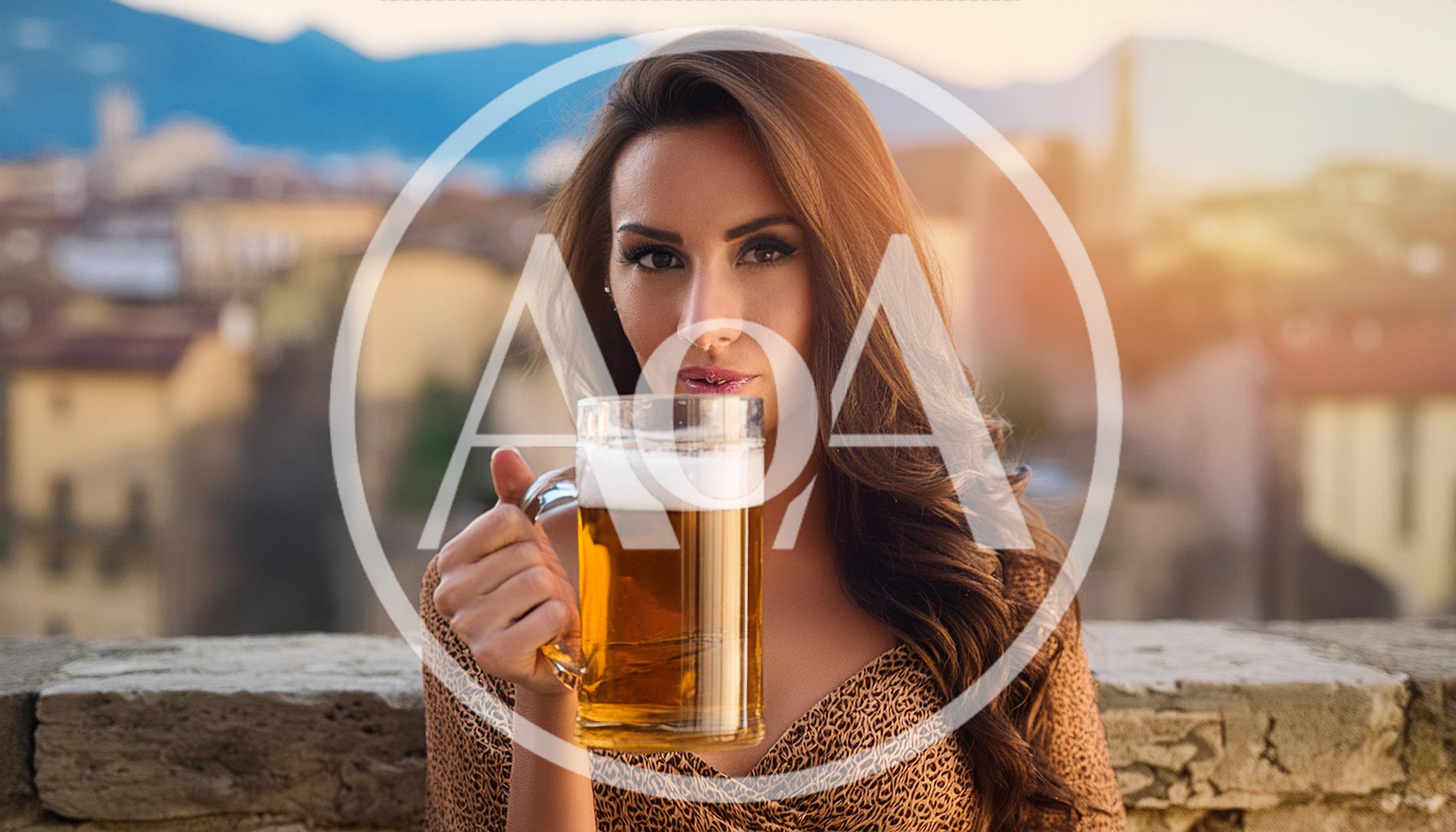 Beautiful Woman Holding A Large Beer Mug Outdoors
