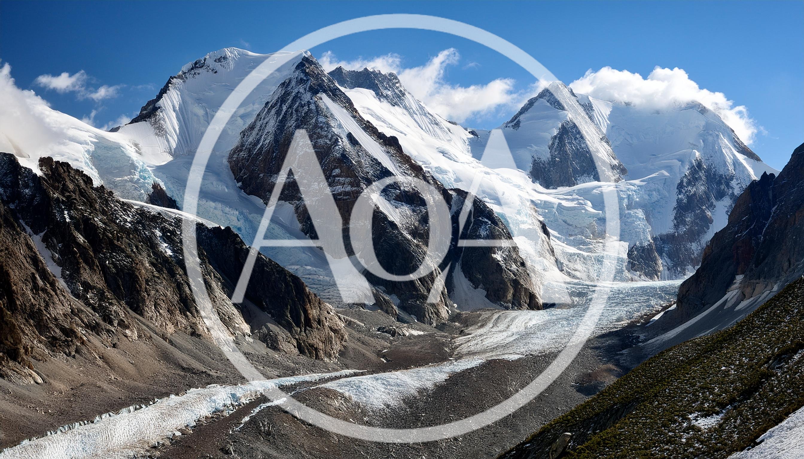 Majestic Snow Covered Peaks And Glacial Valley