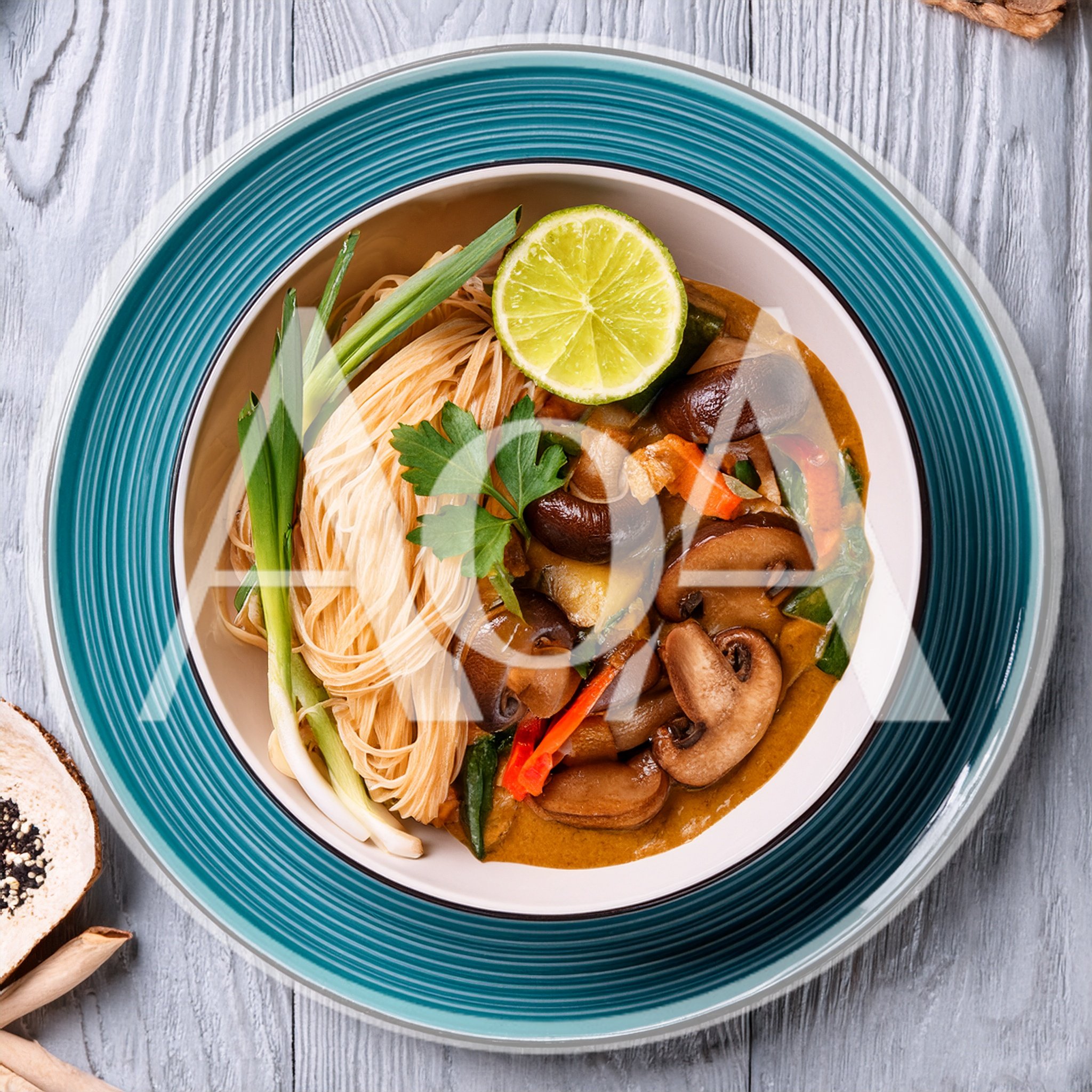 Bowl Of Thai Mushroom Curry With Rice Noodles
